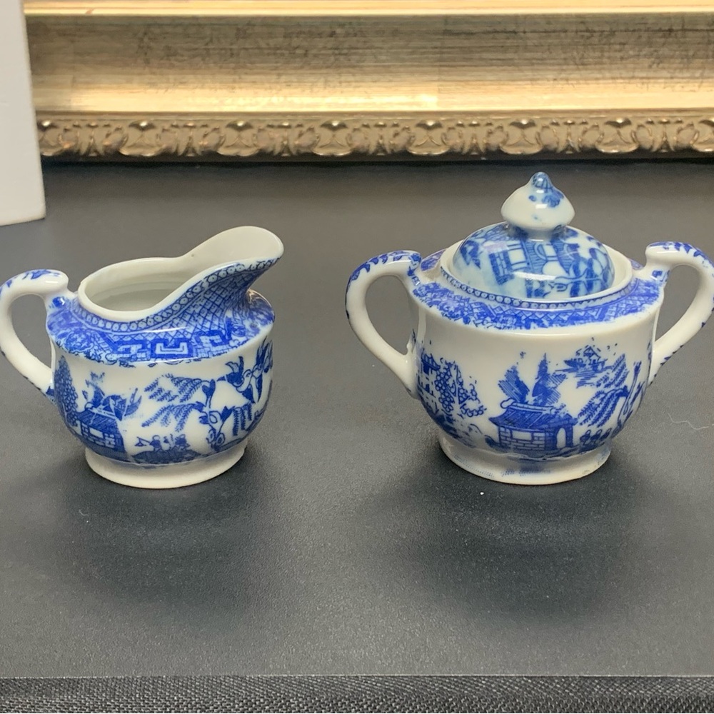 This is a miniature Blue Willow creamer and lidded sugar bowl set!!!